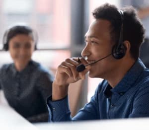 Two people working in customer service